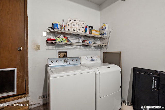 7409 S Timberview Dr, Wasilla, AK 99623 - laundry room featuring washer and dryer