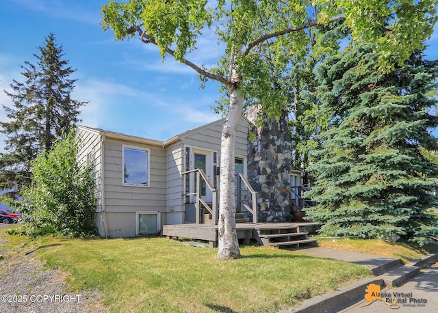 124 E 7th Ave, Anchorage, AK 99501 - view of front of home with a front lawn and a deck
