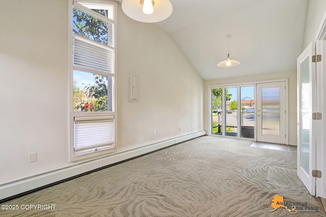 124 E 7th Ave, Anchorage, AK 99501 - carpeted spare room featuring baseboard heating, vaulted ceiling, and electric panel