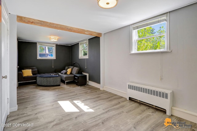 124 E 7th Ave, Anchorage, AK 99501 - sitting room with radiator and wood finished floors