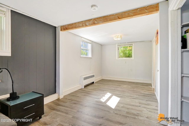 124 E 7th Ave, Anchorage, AK 99501 - below grade area with radiator and wood finished floors