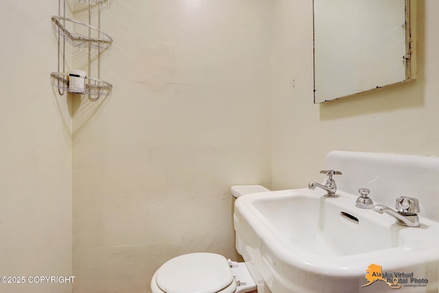 124 E 7th Ave, Anchorage, AK 99501 - half bathroom with a sink and toilet