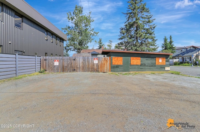124 E 7th Ave, Anchorage, AK 99501 - view of property exterior with driveway