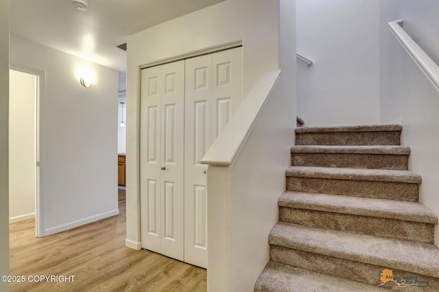 6314 Whispering Loop # 30A, Anchorage, AK 99504 - stairs with wood finished floors and baseboards