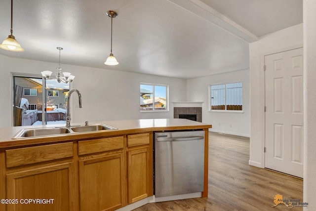 6314 Whispering Loop # 30A, Anchorage, AK 99504 - kitchen featuring dishwasher, a chandelier, light wood-style floors, hanging light fixtures, and open floor plan
