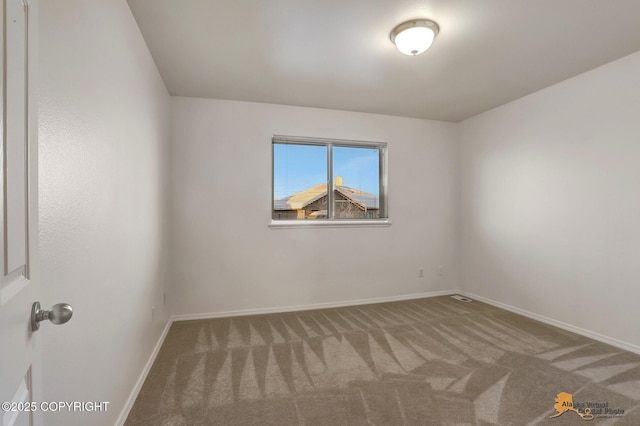 6314 Whispering Loop # 30A, Anchorage, AK 99504 - spare room featuring carpet floors and baseboards