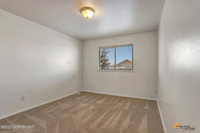 6314 Whispering Loop # 30A, Anchorage, AK 99504 - carpeted spare room with baseboards
