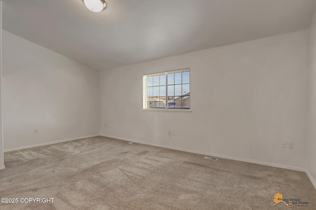 6314 Whispering Loop # 30A, Anchorage, AK 99504 - spare room featuring carpet floors and baseboards