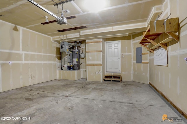 6314 Whispering Loop # 30A, Anchorage, AK 99504 - garage featuring a garage door opener, electric panel, heating unit, and water heater