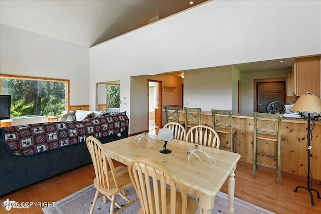 34494 Grizzly Ln, Sterling, AK 99672 - dining room with wood finished floors and high vaulted ceiling