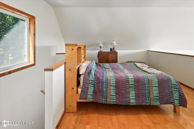 34494 Grizzly Ln, Sterling, AK 99672 - bedroom featuring wood finished floors and baseboards