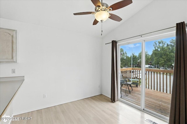 3709 Encore Cir, Anchorage, AK 99507 - spare room featuring light wood-style floors, lofted ceiling, and a ceiling fan