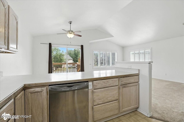 3709 Encore Cir, Anchorage, AK 99507 - kitchen featuring stainless steel dishwasher, a peninsula, ceiling fan, light countertops, and vaulted ceiling