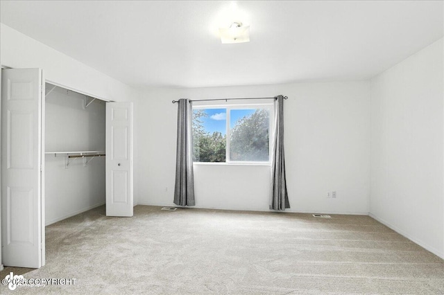 3709 Encore Cir, Anchorage, AK 99507 - unfurnished bedroom featuring carpet floors and a closet