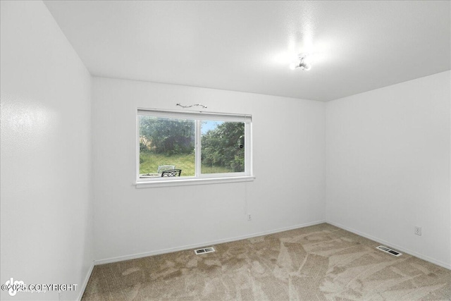 3709 Encore Cir, Anchorage, AK 99507 - carpeted empty room featuring baseboards