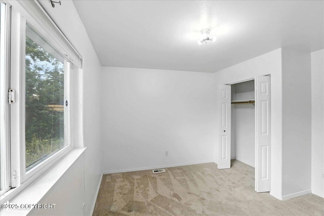 3709 Encore Cir, Anchorage, AK 99507 - unfurnished bedroom with carpet flooring and a closet