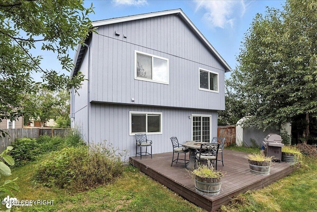 3709 Encore Cir, Anchorage, AK 99507 - back of house featuring a deck and a fenced backyard