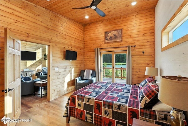 23634 Kasilof River Cir, Kasilof, AK 99610 - bedroom with wooden ceiling, access to outside, wooden walls, wood finished floors, and recessed lighting