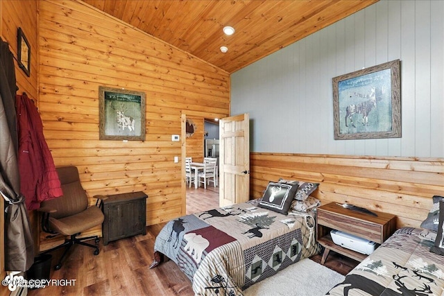 23634 Kasilof River Cir, Kasilof, AK 99610 - bedroom with vaulted ceiling, wood finished floors, wood ceiling, and wood walls