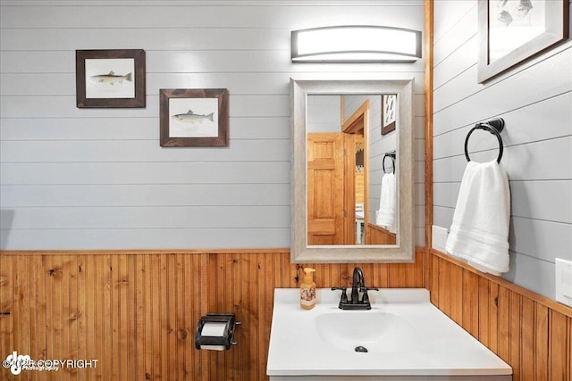 23634 Kasilof River Cir, Kasilof, AK 99610 - bathroom featuring wood walls and vanity
