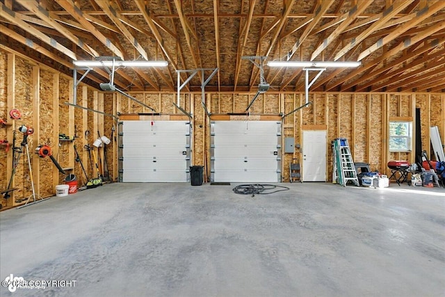 23634 Kasilof River Cir, Kasilof, AK 99610 - garage featuring a garage door opener