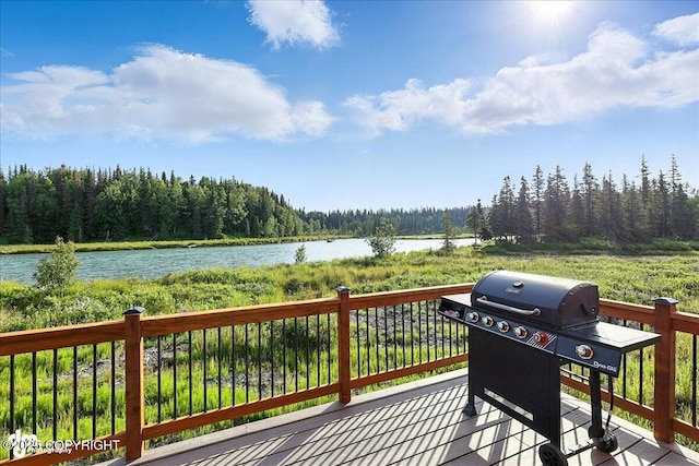 23634 Kasilof River Cir, Kasilof, AK 99610 - wooden deck featuring a forest view, area for grilling, and a water view