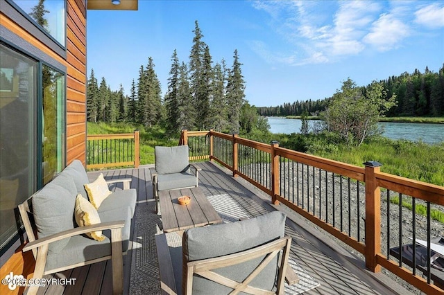 23634 Kasilof River Cir, Kasilof, AK 99610 - wooden deck featuring a water view, a view of trees, and outdoor lounge area