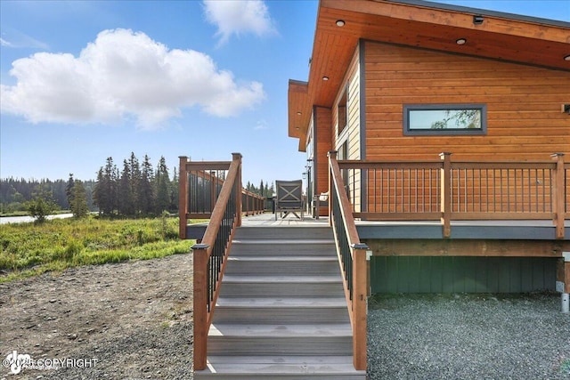23634 Kasilof River Cir, Kasilof, AK 99610 - view of home's exterior featuring a deck and stairs
