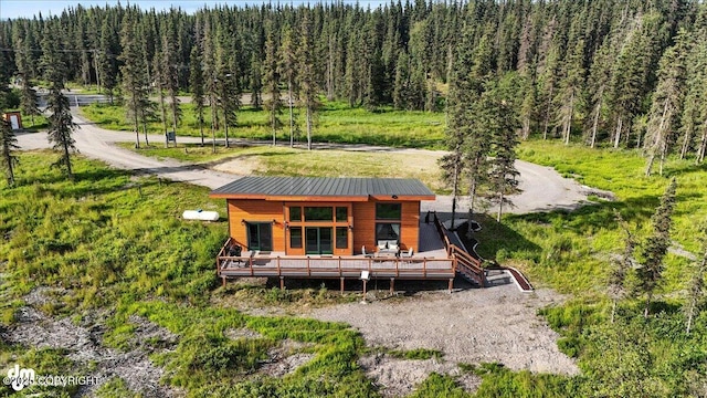 23634 Kasilof River Cir, Kasilof, AK 99610 - rear view of house featuring a view of trees