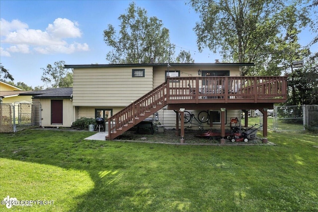 2924 Carnaby Way, Anchorage, AK 99504 - back of property featuring a gate, stairway, and a deck