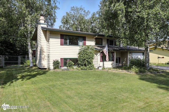 2924 Carnaby Way, Anchorage, AK 99504 - view of front of property featuring a garage, a chimney, a gate, and driveway