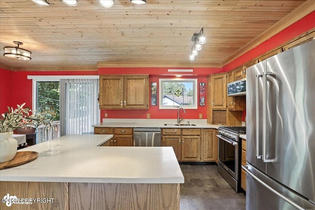 2924 Carnaby Way, Anchorage, AK 99504 - kitchen featuring appliances with stainless steel finishes, light countertops, brown cabinets, and wood ceiling