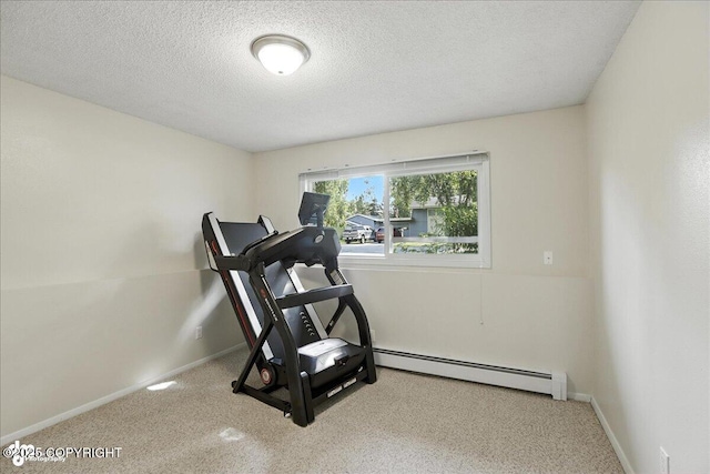 2924 Carnaby Way, Anchorage, AK 99504 - exercise area featuring baseboard heating, carpet flooring, and a textured ceiling