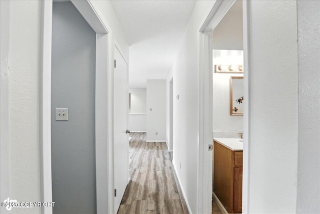 2924 Carnaby Way, Anchorage, AK 99504 - hall with wood finished floors and baseboards