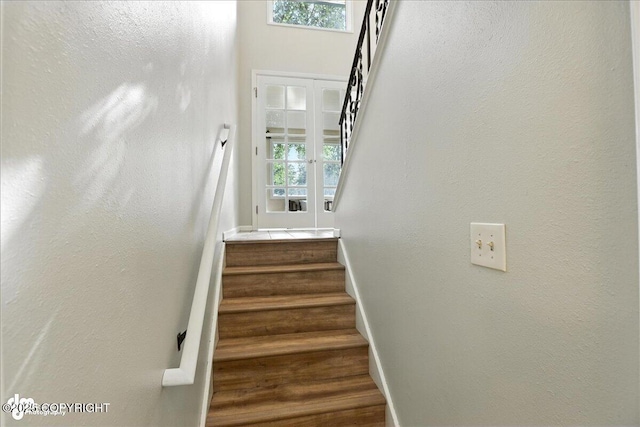 2924 Carnaby Way, Anchorage, AK 99504 - staircase featuring baseboards and wood finished floors