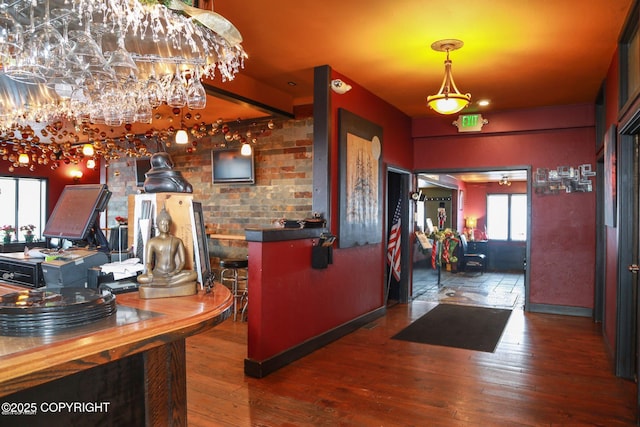 59217 E E End Rd, Homer, AK 99603 - bar area with hardwood / wood-style floors and a chandelier