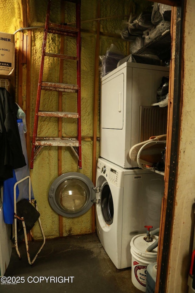 59217 E E End Rd, Homer, AK 99603 - washroom with stacked washer / dryer