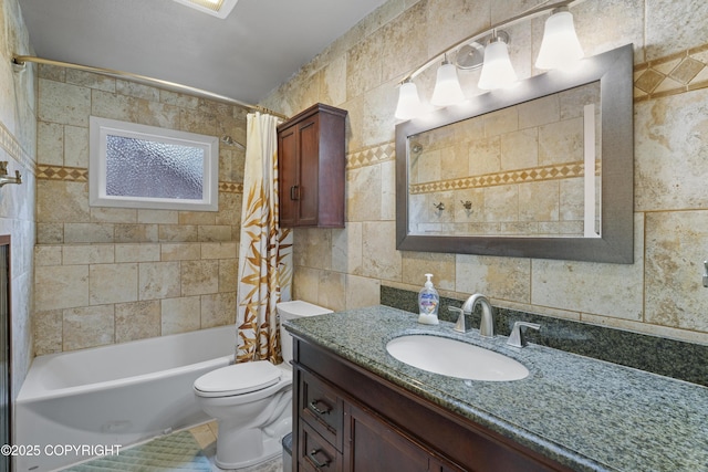 10711 Colville St, Eagle River, AK 99577 - bathroom featuring tile walls, vanity, and shower / tub combo