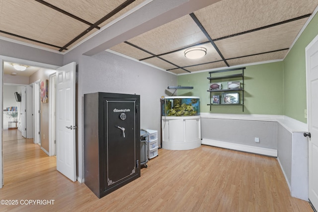 10711 Colville St, Eagle River, AK 99577 - kitchen featuring wood finished floors and a wainscoted wall