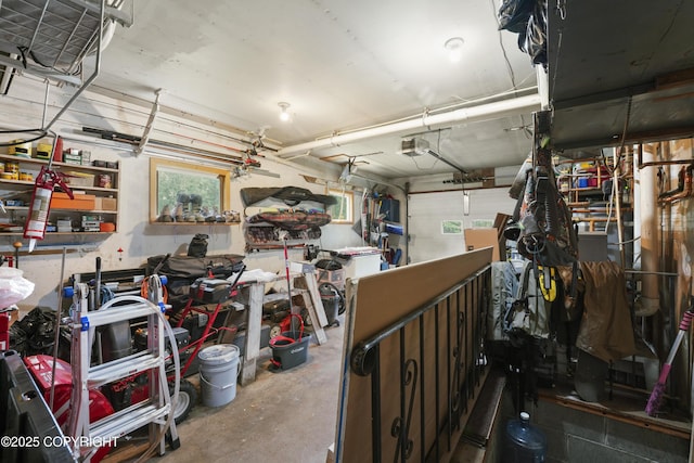 10711 Colville St, Eagle River, AK 99577 - garage featuring a workshop area and a garage door opener