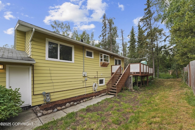 10711 Colville St, Eagle River, AK 99577 - back of house featuring stairs and a wooden deck