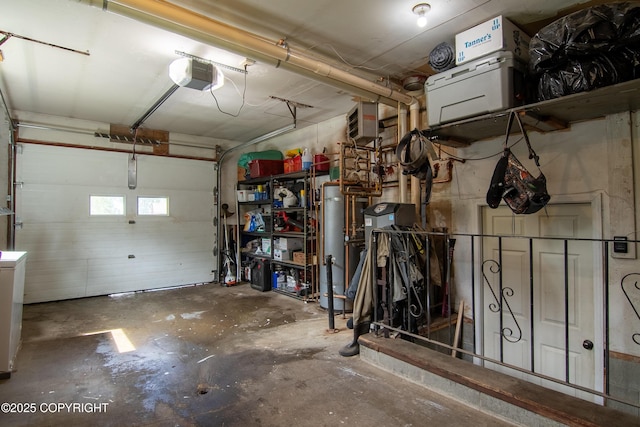 10711 Colville St, Eagle River, AK 99577 - garage featuring a garage door opener and gas water heater