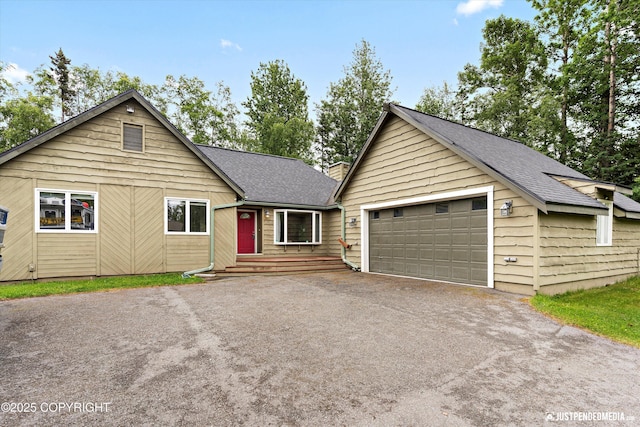 15201 Pollock Dr, Anchorage, AK 99516 - view of front of property with roof with shingles and driveway