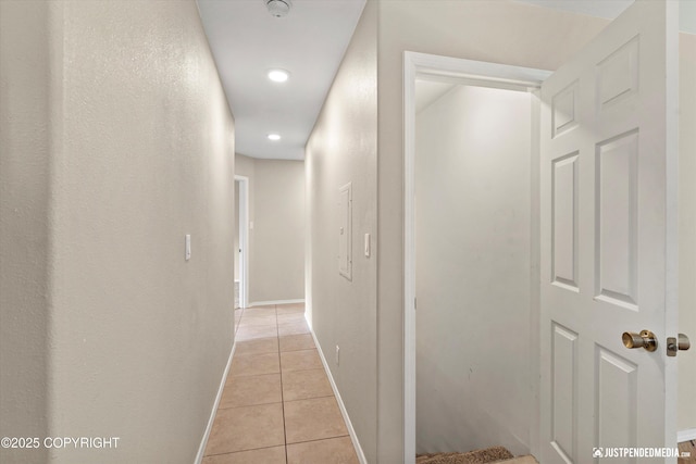 15201 Pollock Dr, Anchorage, AK 99516 - hall with light tile patterned floors and recessed lighting