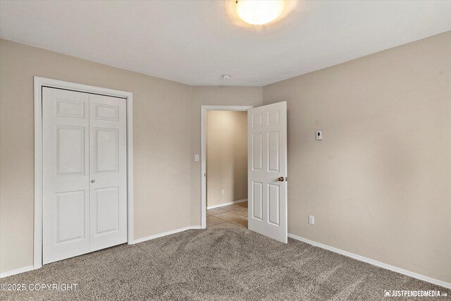 15201 Pollock Dr, Anchorage, AK 99516 - unfurnished bedroom with carpet flooring and a closet