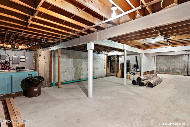 15201 Pollock Dr, Anchorage, AK 99516 - unfinished basement featuring electric panel