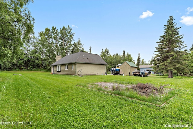 15201 Pollock Dr, Anchorage, AK 99516 - view of grassy yard