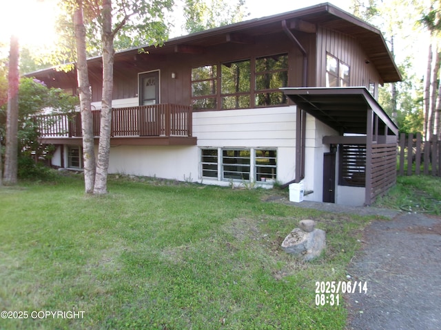 5731 College Dr, Anchorage, AK 99504 - rear view of property with a yard