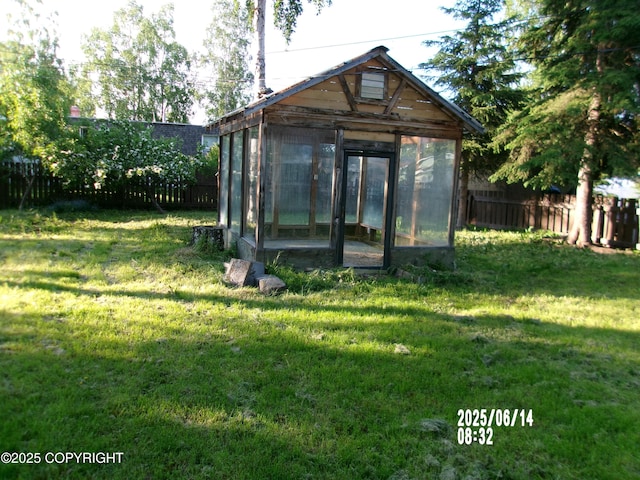 5731 College Dr, Anchorage, AK 99504 - view of greenhouse featuring a fenced backyard