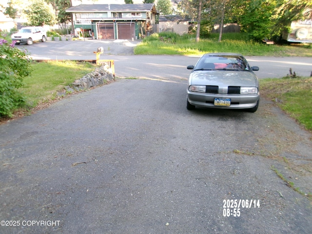 5731 College Dr, Anchorage, AK 99504 - view of asphalt road